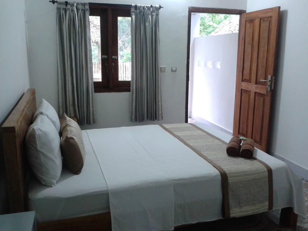Putri Homestay Gili Meno Esterno foto